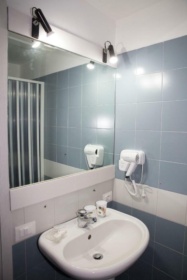 Chambre Quadruple avec Salle de Bains Commune